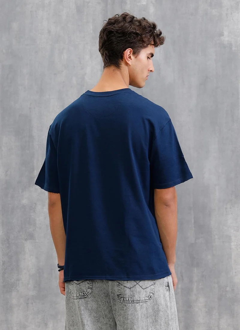 Wrogn Solid Oversized T-Shirt With Printed Canvas Patch And Raw Edge Detail | Navy